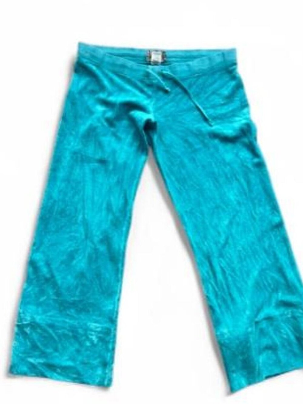 Juicy Couture teal sweatpants that have been made into capri pants